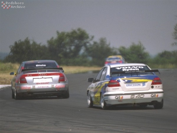 Rickard Rydell (Volvo) and Frank Biela (Audi)
